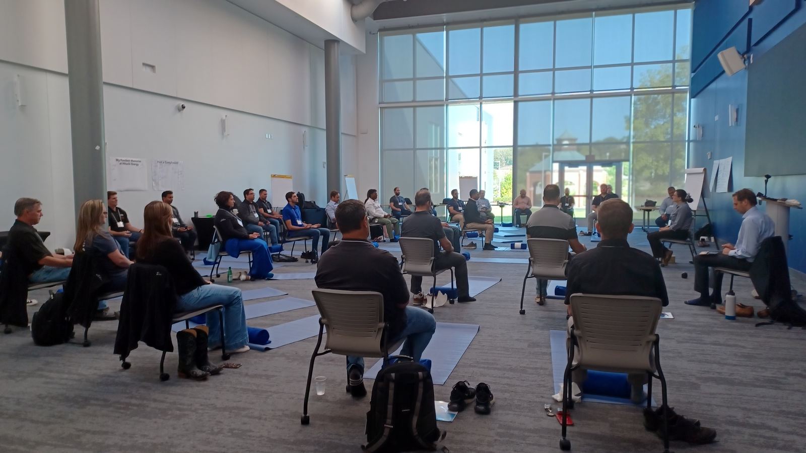 Leaders seated in a calm circle with their TLEX teacher during a TLEX SKY Immersion Retreat